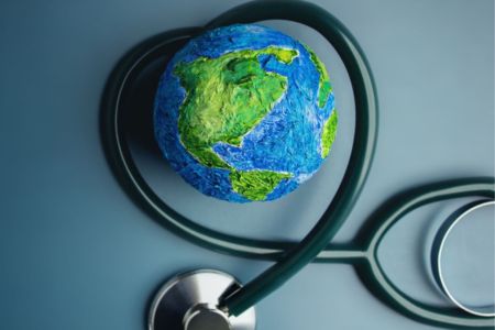 Image of Stethoscope around Globe