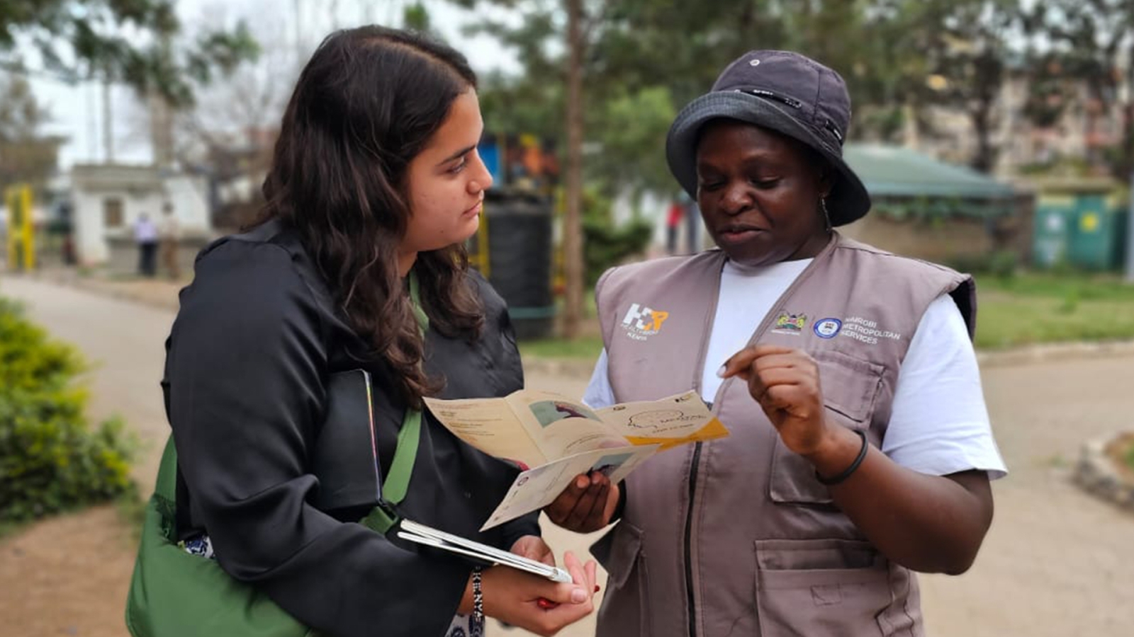 HealthRight Intern working with community healthcare worker