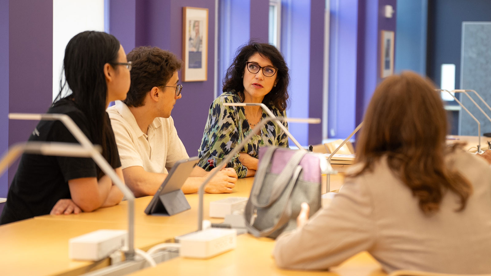 Professor meeting with students