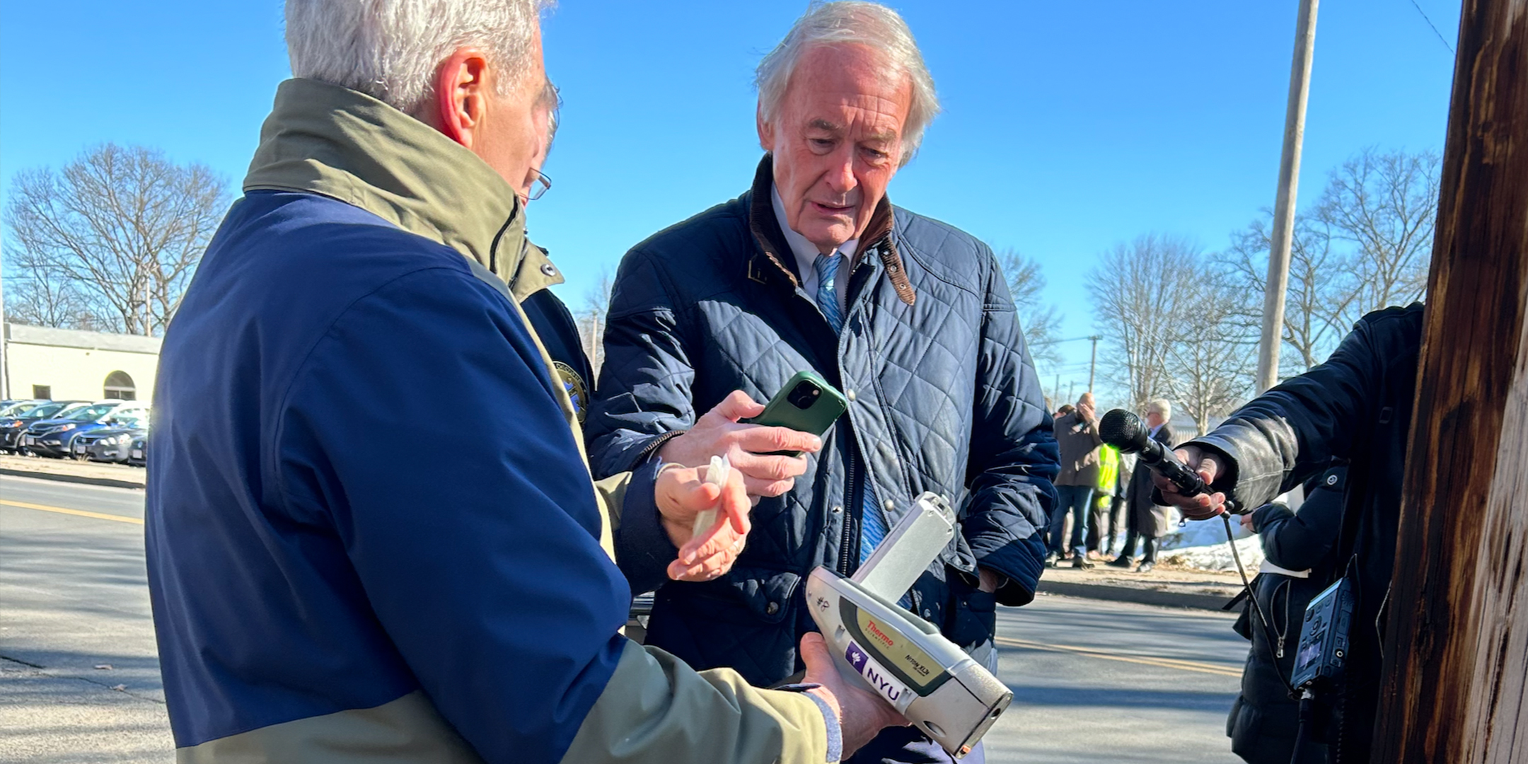 Jack Caravanos showing lead test results to Senator Ed Markey