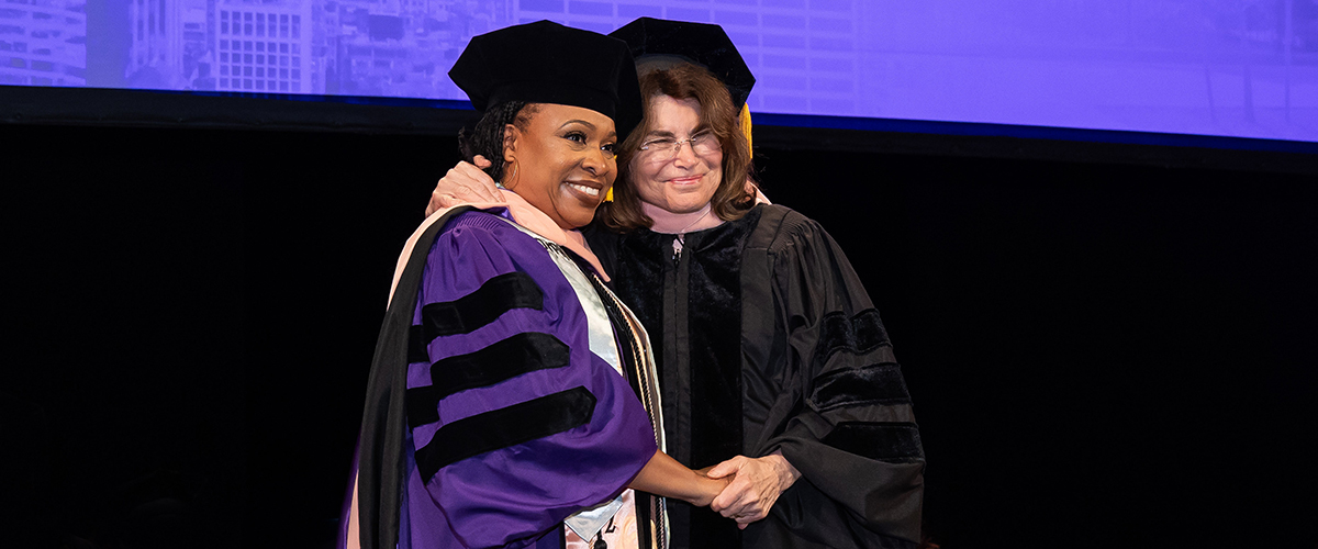 Marsha Williams shaking Robyn Gershon's hand