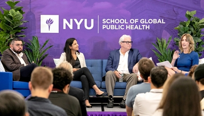 Panelists sitting on stage
