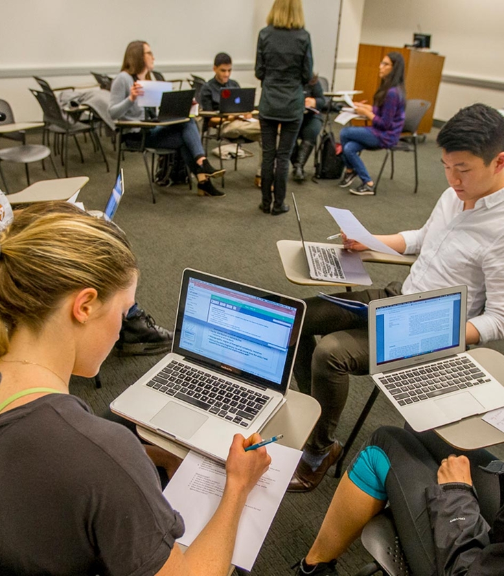 Students working in groups in a classroom