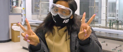 Jailee Mendo wearing goggles in a Chemistry lab