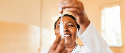 Doctor preparing vaccine