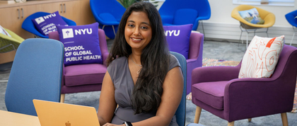 A student working on her laptop