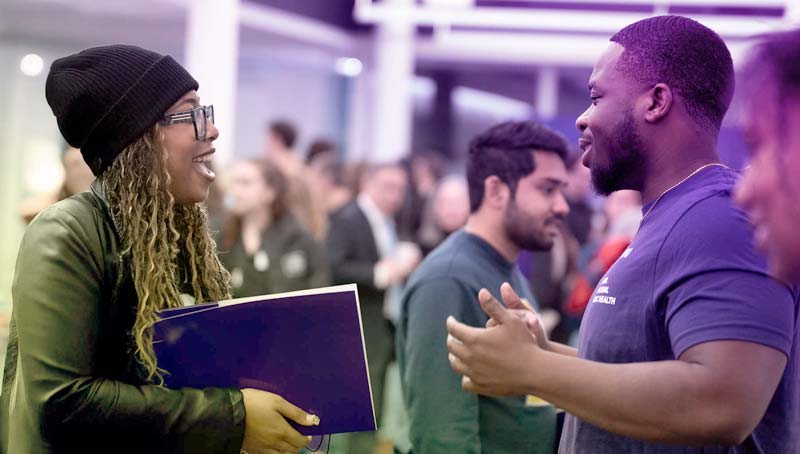 Prospective students at an admissions event