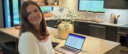 Chloe working from her kitchen counter